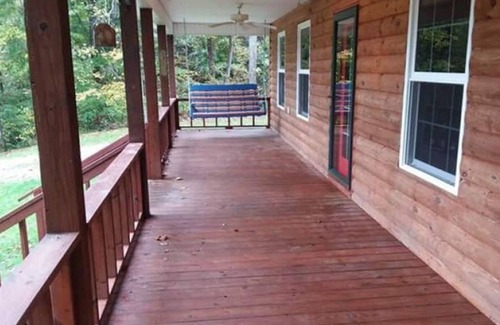 Fort Gay Cabin | The Bunkhouse A two story rustic cabin 3BR 2BA