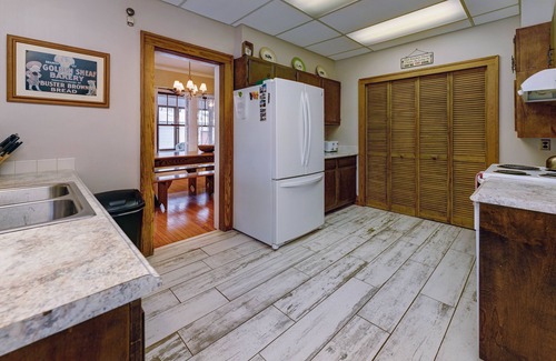 Huron House | The Buster Brown Shoe House - lakefront with gazebo and wrap-around porch