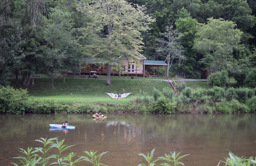 Lansing Cabin | The Cabin- Riverside Cabin Perfect For Your Family Getaway.or romantic getaway