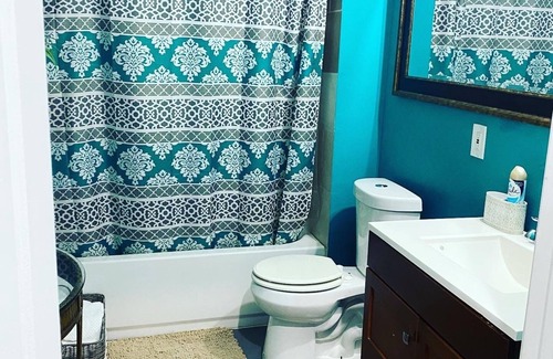 Powder Springs House | The Classy Cave! A spacious, basement suite hideaway w/hotel style kitchenette.