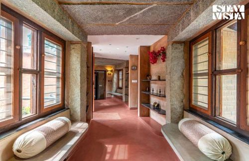 Doddaballapur Villa | The Clay Courtyard by VEO - Part of StayVista