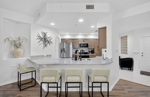Tropical Cove Condo | The Coastal Gem at Lexington CC Lake Village
