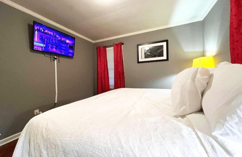 Belvedere Park House | The Cozy Home Comfy King and TV in every room