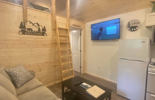 Old Mill Cabin | The Denali cabin, beautiful wood interior and vaulted ceilings.