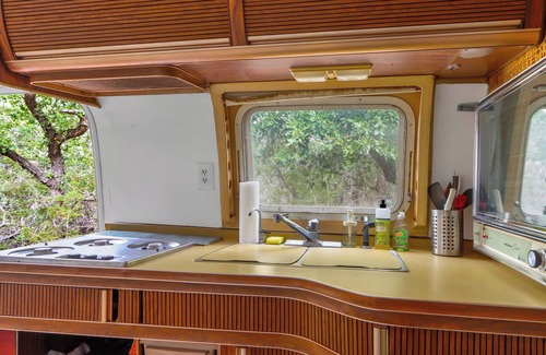 Driftwood House | The Driftwoods - Vintage Blue Airstream for Unique Driftwood Getaway