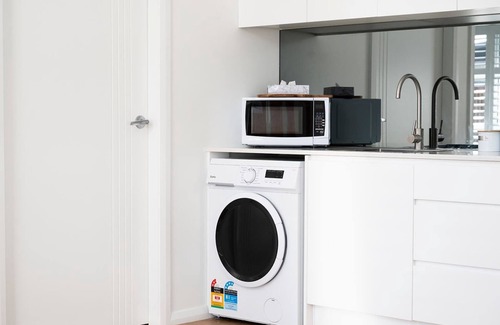 Orange Apartment | The Elm Apartments - The Black & White Room