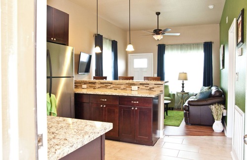Kyle House | "The Garden"/A little bit country, close to town, new, fresh and clean.