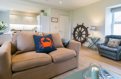 Caergeiliog Cottage | The Gun Room - an on the beach that sleeps 4 guests in 2 bedrooms