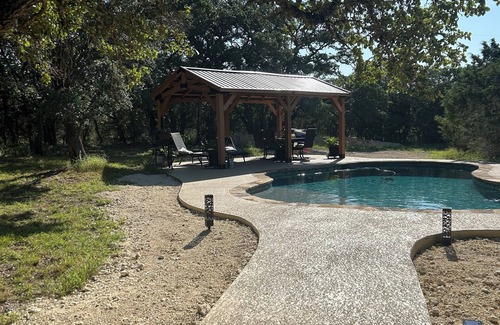 Wimberley House | The Hama a Tommy Bahama Airstream on a small Horse Farm with a Pool