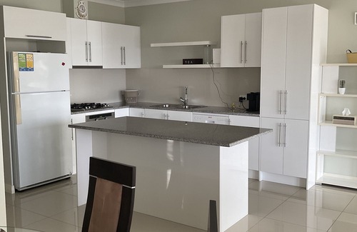 North Beach House | The happy place-Comfortable 3 bedroom home with sea views. Steps to the beach.
