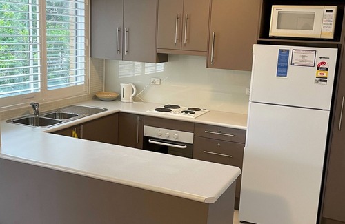 Nelson Bay Apartment | The Helm, 12/22 Voyager Close - unit in Little Beach with direct access to Shoal Bay Beach