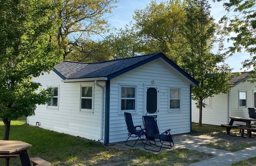 Oscoda Cottage | The Hideaway- Haven on HuronnA fresh and airy cabin directly on Lake Huron!