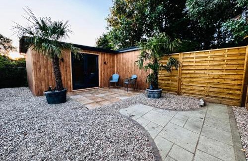 Hythe House | The Hideout - private luxury cabin near the sea with garden area, sea views and parking