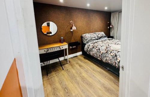 Hythe House | The Hideout - private luxury cabin near the sea with garden area, sea views and parking