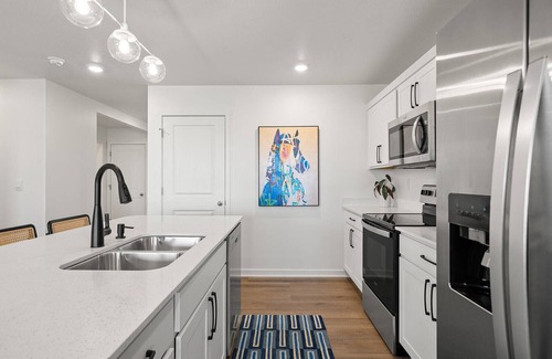 Elkhart House | The House Divided. New Home. Hot Tub. Game Room. Open Concept Living Spaces.