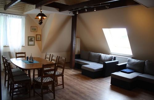 Schwerin Apartment | The house on the lake, with small. Beach, bathing area, gr. Sunbathing lawn, playground