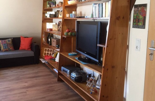 Schwerin Apartment | The house on the lake, with small. Beach, bathing area, gr. Sunbathing lawn, playground