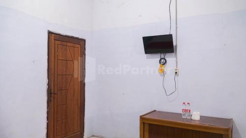 Medan Hotel | The Karo's Residence Mitra RedDoorz