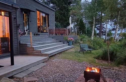Sandviken House | The lake house - boats, beach, sauna and barbecue