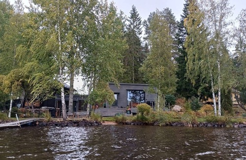 Sandviken House | The lake house - boats, beach, sauna and barbecue