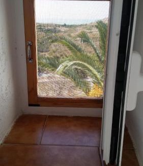 Kithira Apartment | The large bougainvillea house