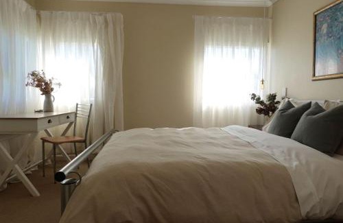 Primrose Sands House | The Lazy Fig - Ocean Views, Orchard & Pizza Oven
