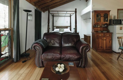Bandon Grove Cabin | The Lilypond - a beautiful escape with log fire & spa bath surrounded by nature.