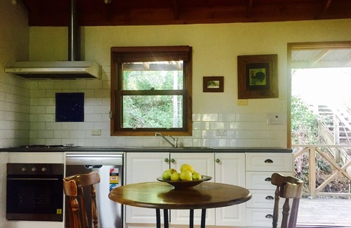 Bandon Grove Cabin | The Lilypond - a beautiful escape with log fire & spa bath surrounded by nature.