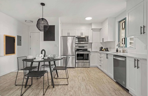 Downtown West End Condo | The Loki | Free C-Train to Stampede Grounds!