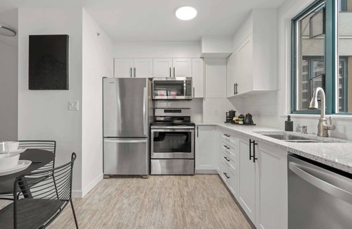 Downtown West End Condo | The Loki | Free C-Train to Stampede Grounds!