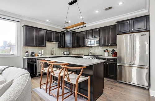 Midtown Condo | The Lumber Baron's Downtown Mansion 3BR/2.5BA Top Floor Penthouse