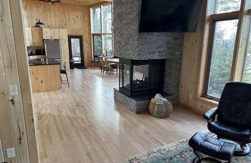 Puposky Cottage | The newly remodeled Stone Cabin with sandy beach and clean clear water