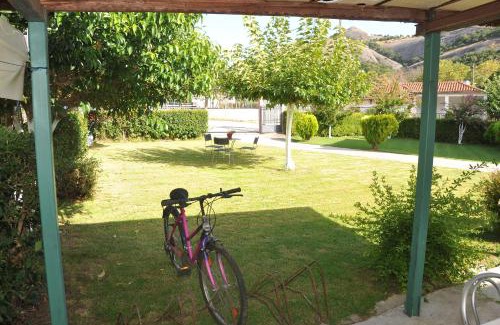 Kalambaka Apartment | The Other Side of Meteora with lush garden, BBQ & pavillion