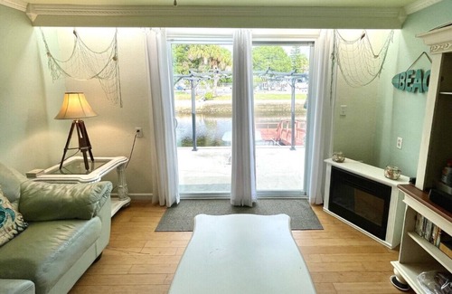 Hudson House | THE OTTER POD; a rare Canal Waterfront Gulf access Home,