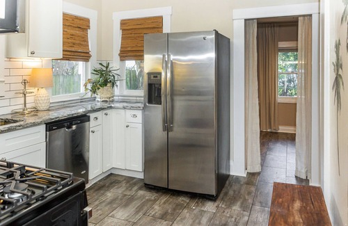 Old Seminole Heights House | The Palms Bungalow - Tampa getaway w/Paddle board. Pet-friendly!