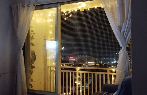 Mira Road East Apartment | The perchnOne cosy room with swimming pool and gym.