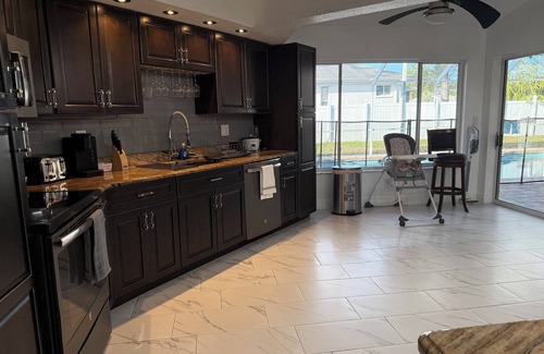 Berkeley Manor House | The Perfect Gateway Home with a large pool area, Gazebo, all fenced in.