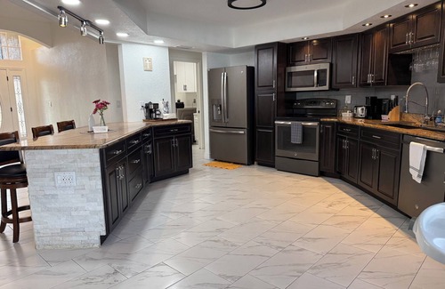 Berkeley Manor House | The Perfect Gateway Home with a large pool area, Gazebo, all fenced in.