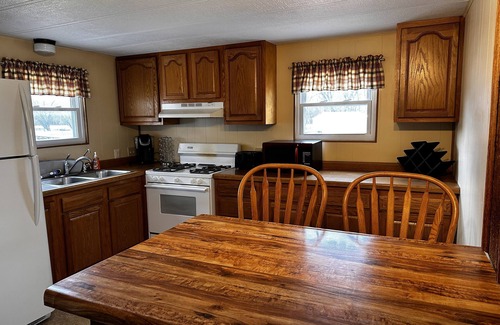 Bagley House | The Pier Cottage located in River of Lakes
