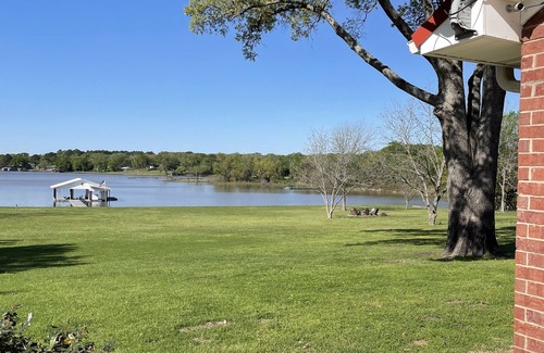 Eustace House | The Porch on Cedar Creek - gated & secluded 10 acre lake front escape