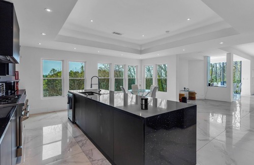 Sandy Springs House | The Push Palace: Where Extravagance Meets Grandeur in Luxurious Living