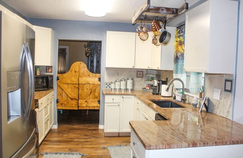 Port Malabar House | The Rustic Retreat: Heated Pool, Movie Theater, Event Rental !