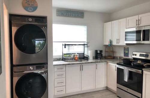 Marathon House | THE SANDCASTLE SUITE! Brand New 2Bedroom in Oceanfront Complex! BE THE FIRST to Visit our Condo Townhome with FREE Parking & Private Garage at Ocean Isles 38 Marathon FL KEYS! SPECIAL PRICING!
