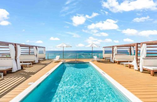 West Bay Apartment | The Sands #1 - New 7Mile Beach Condo with Rooftop Pool & Luxe Interiors