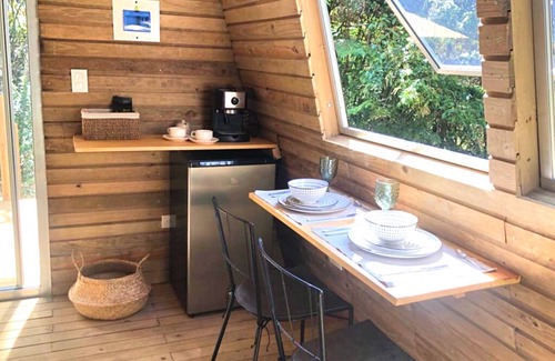 Guarne Cabin | The Shire Glamping - nestled among lush trees, tranquil atmosphere