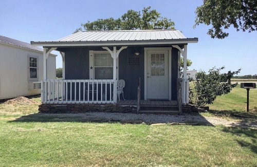 Bryson Cabin | The Stage Coach Cabin is a rustic cabin that sleeps 4.