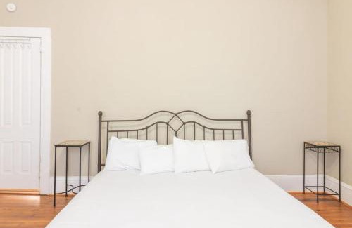 Columbus Apartment | The Sunny Southern Manse Back Walk Downtown