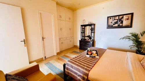Lansdowne House | The Sunshine Room, Deluxe room in The Umri Lansdowne