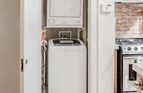 Maple Ridge Apartment | The Teak Follow, beautiful brick enclosed space