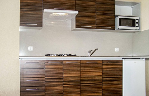 Osieki House | The terraced house is located on large, fenced plot, where also the owner lives.